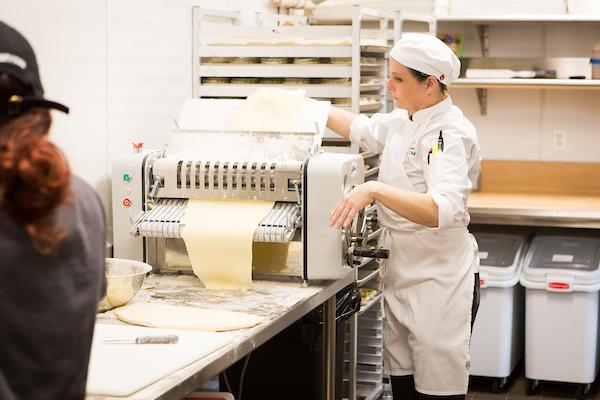 Pastry chef making pie crust at the Pie Cafe located in Campus Commons