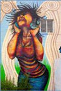 Woman with Headphones mural