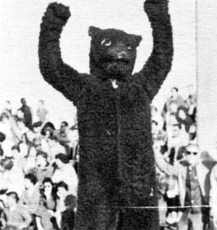 Early UNC Mascot with arms in air
