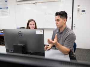 Two students collaborating on a project