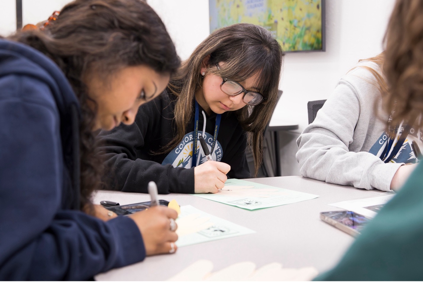 Students at a workshop working in a session.