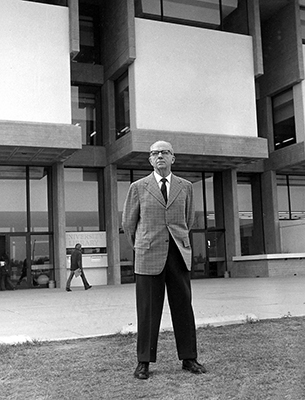 James Michener, in front of Michener Library
