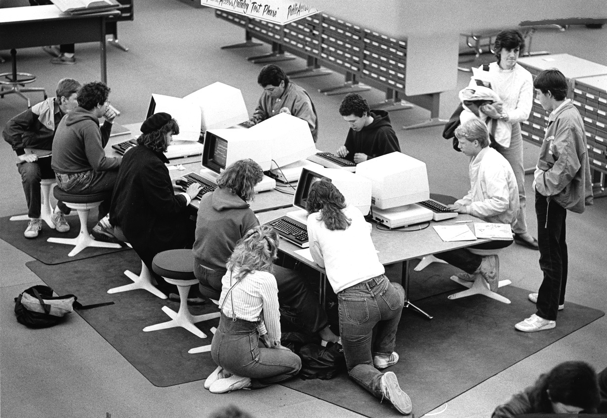 Archival image of students using computers in Michener Library