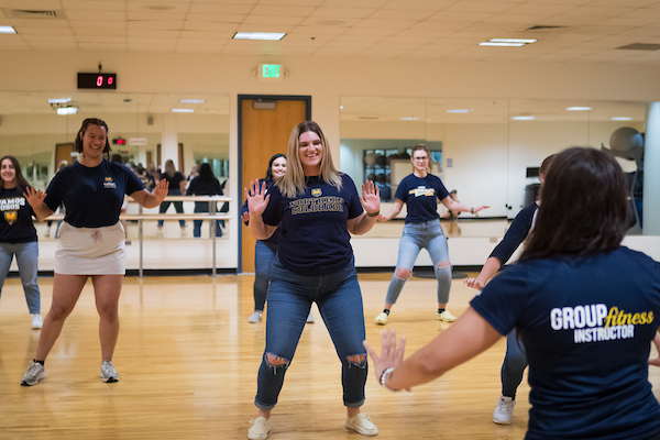 several people completing group fitness class