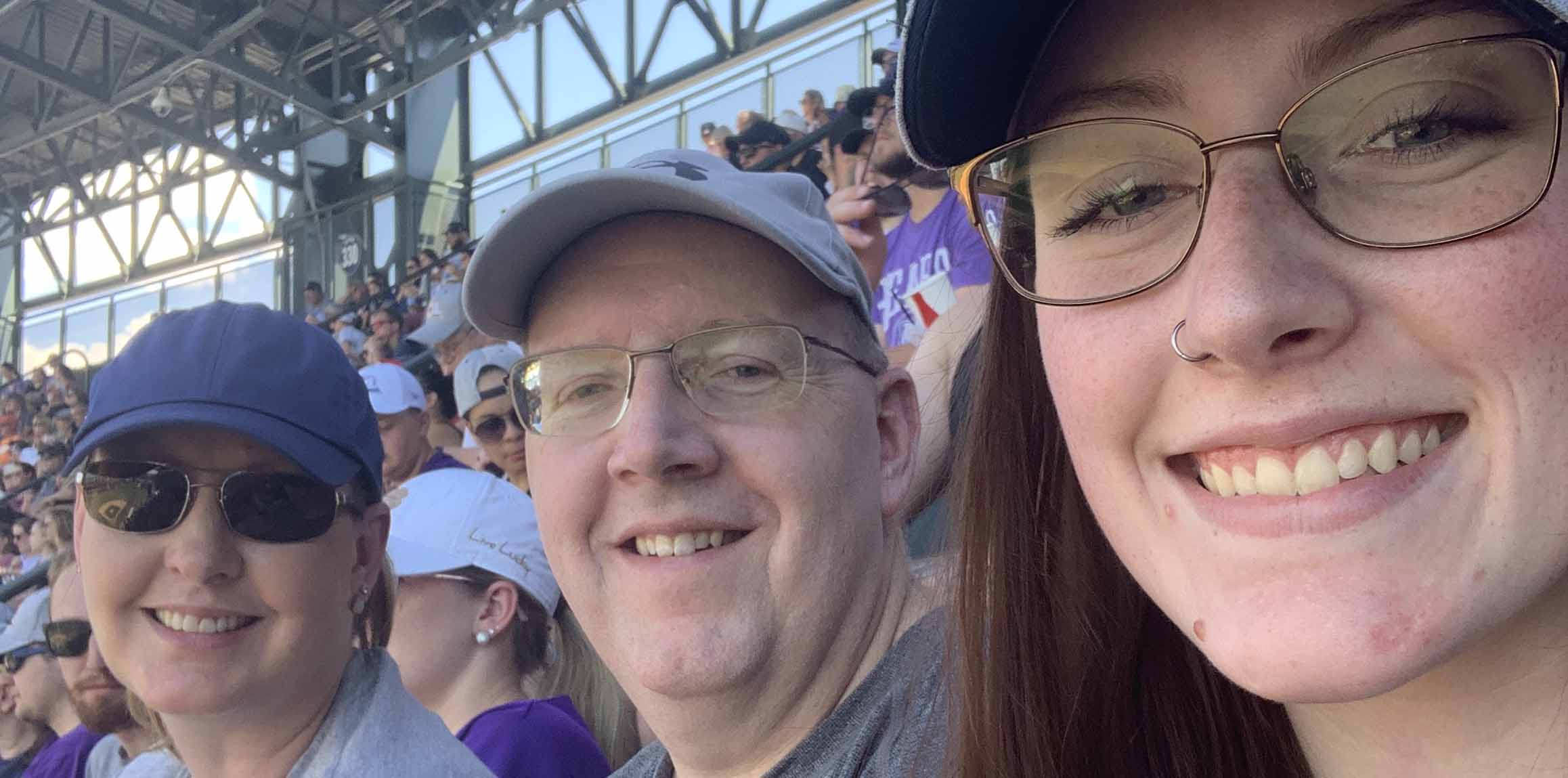 Hannah Rueter and her parents, Wade and Sharon, at UNC Day at the Rockies.