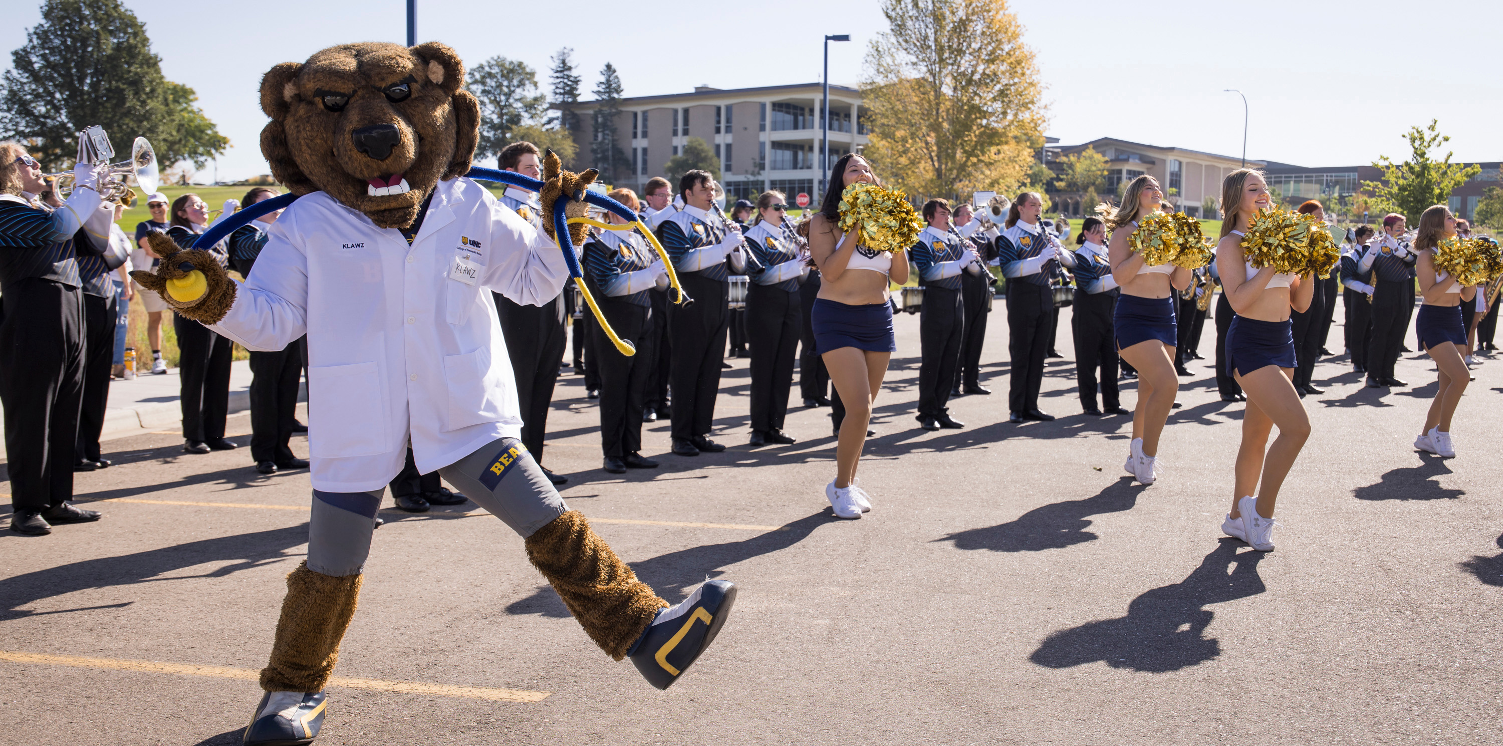 Klawz and cheerleaders at an event