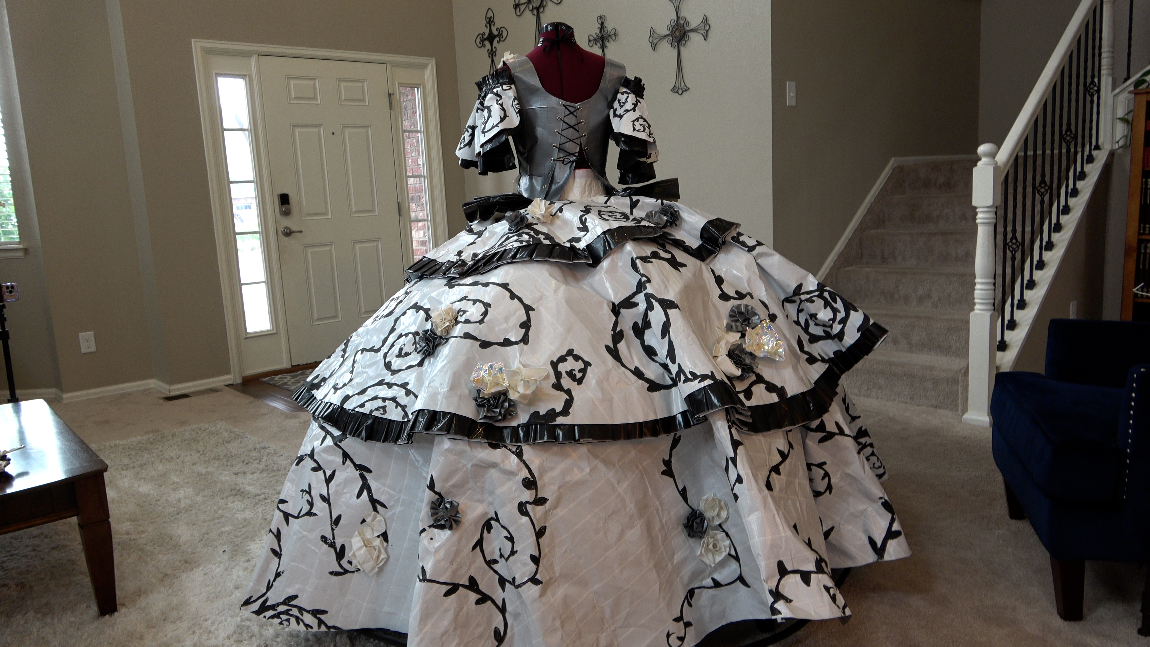 A black and white full dress made out of duct tape