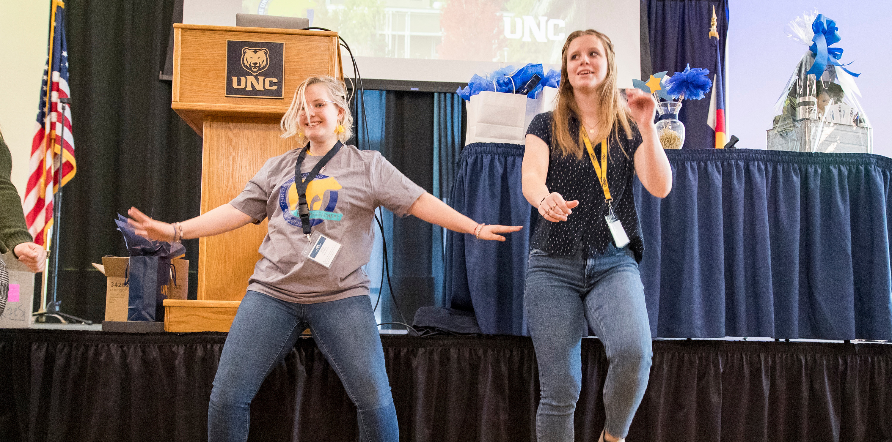 Two students in mid-dance