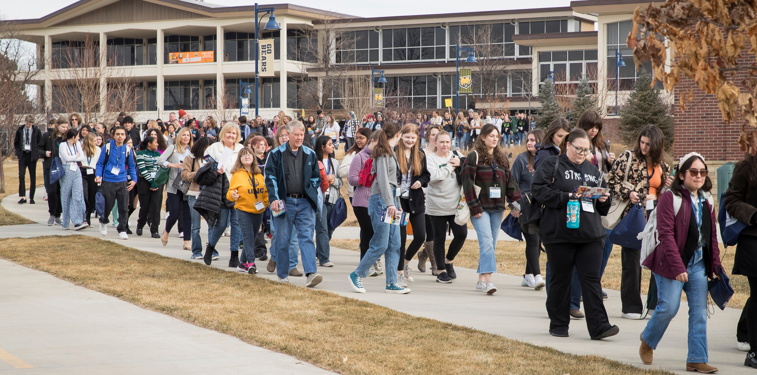 A large group of students walking outside