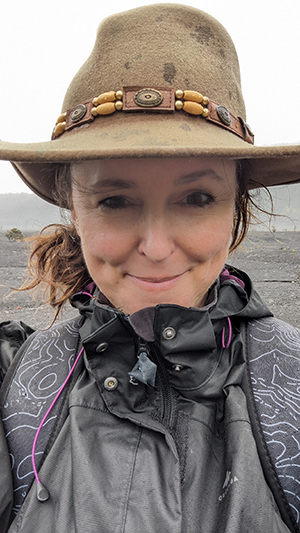 Karen Barton, standing outside, facing front and smiling