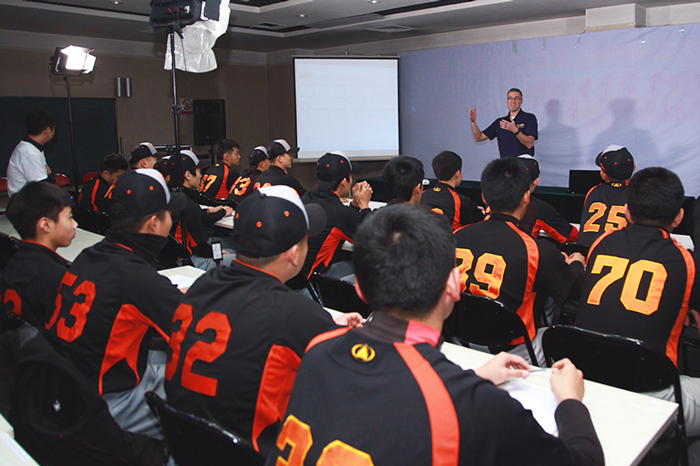 Nichols presenting to Chinese "pro" youth athletes about motivation.