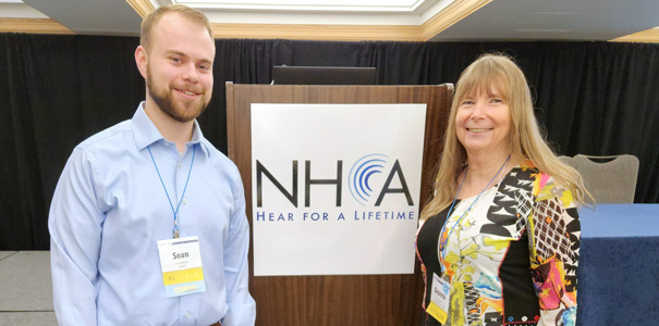 Sean Hoverson (left) and Deanna Meinke, professor of Communication Sciences and Disorders and graduate coordinator of Audiology, at the National Hearing Conservation Association conference in Jacksonville, Florida, in February 2023.