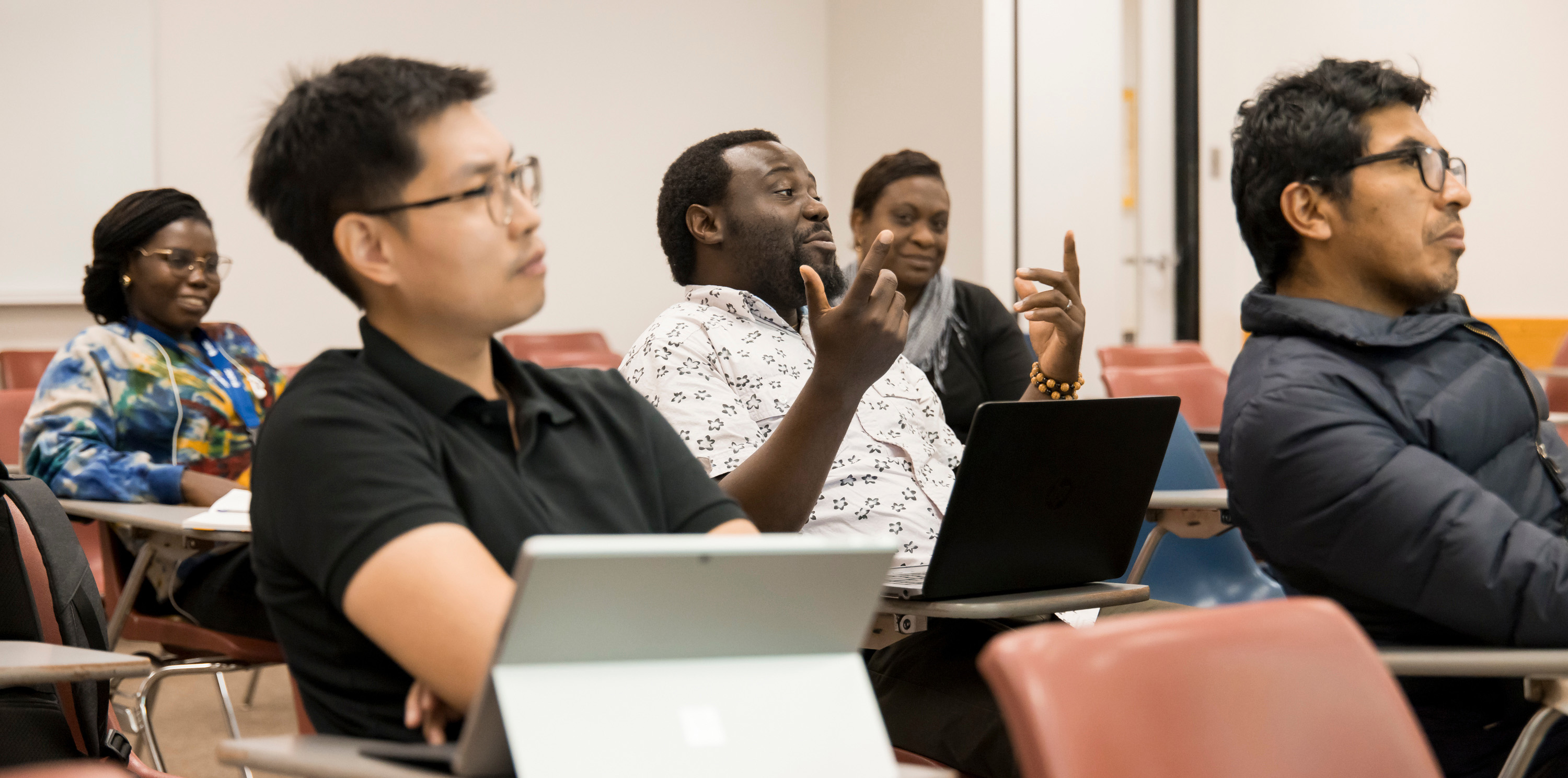 Some international students listening in a classroom