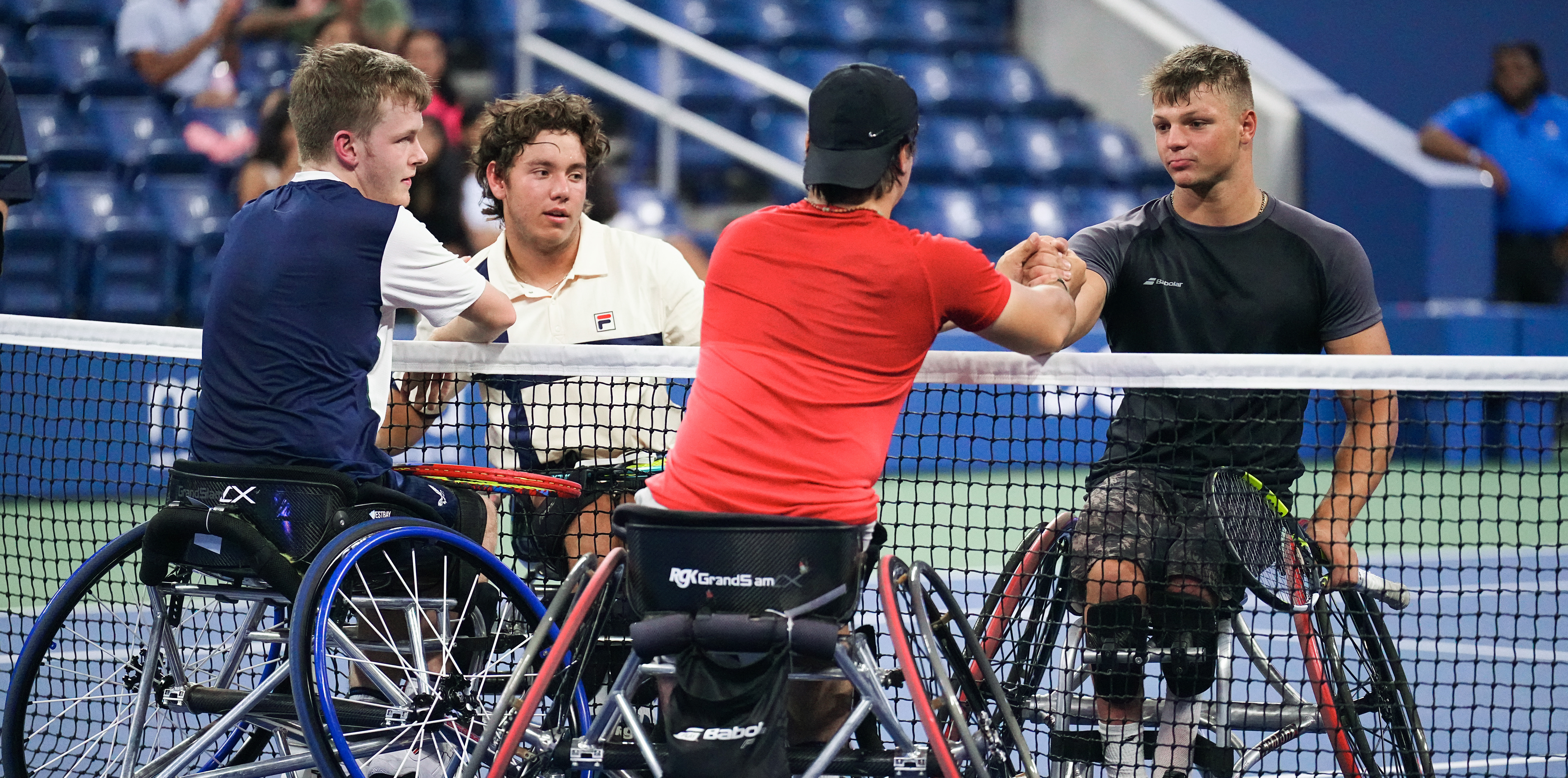 Tomas shaking hands across the net with his competitor in the US Open