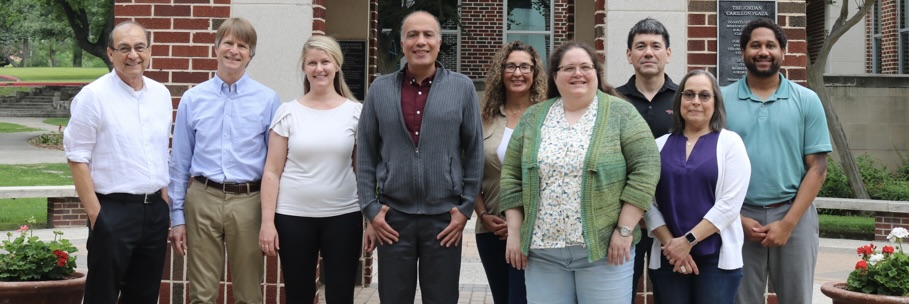 Isaac Wanasika, Maurice Harris, and Jeri Lyons Win pose with their fellow researchers.