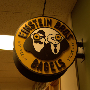 Einsteins Bagel Compnay sign hanging in the UC